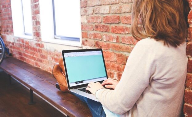 Student using her laptop.