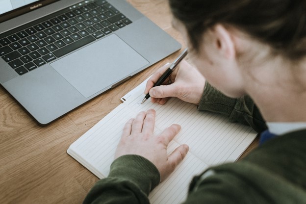 Student making notes. 