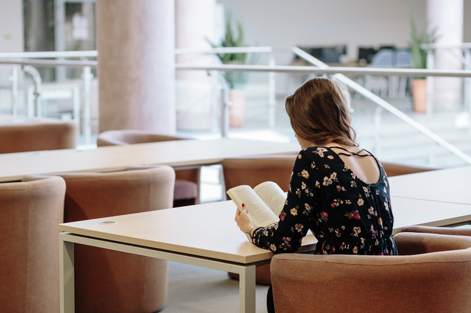 Student reading a book.