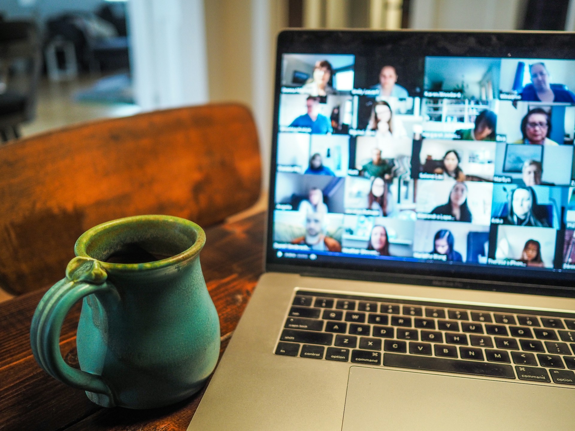 Student taking a class on Zoom for an online photography degree.