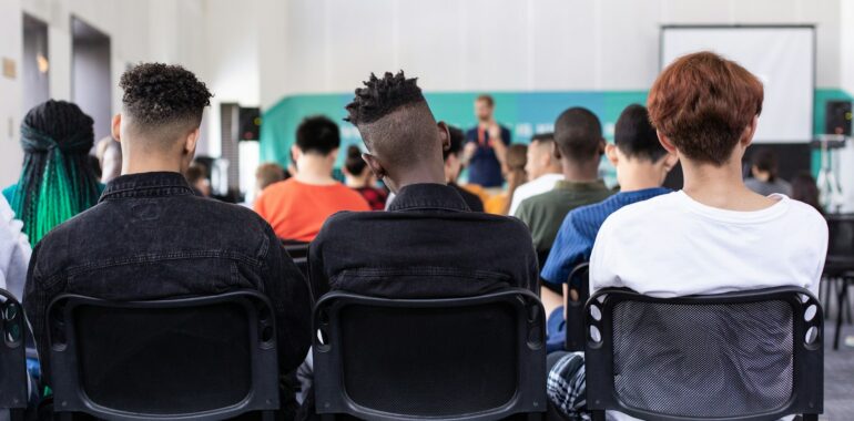 A professor discussing Hawaii colleges with criminology majors.