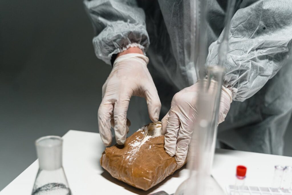 Forensic scientists analyze the evidence gathered to find clues